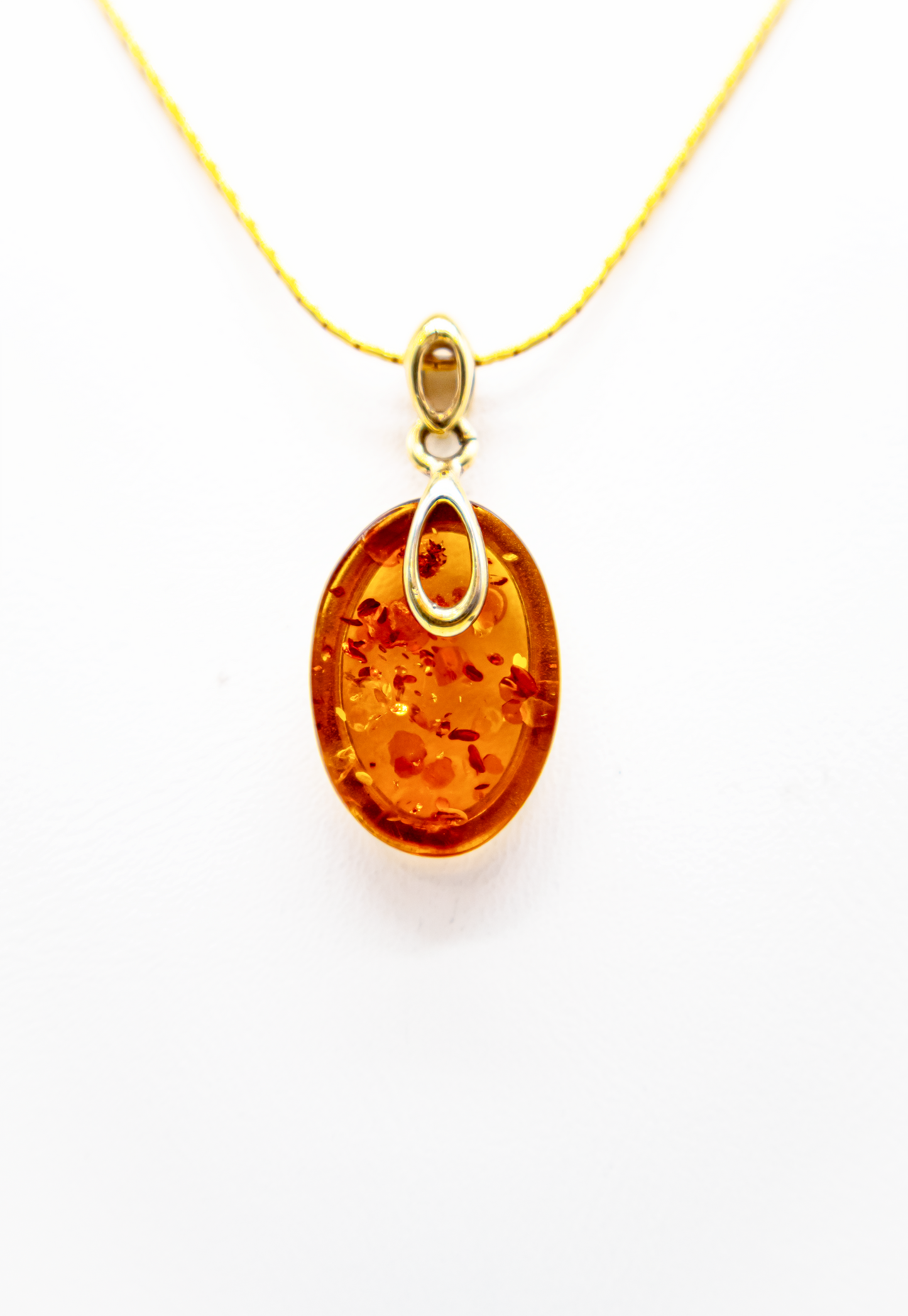 Designer Bernstein Anhänger mit vergoldeter Fassung