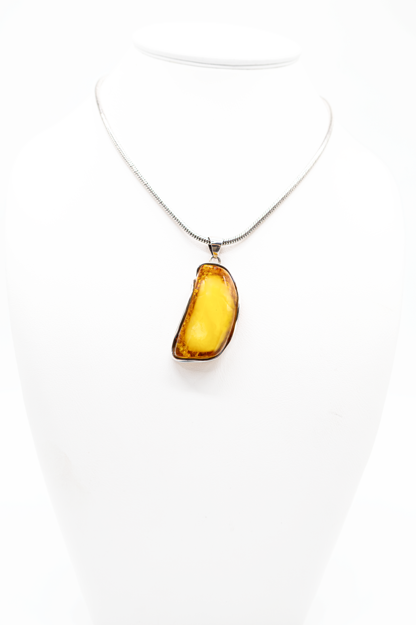 Amber artwork – elegant silver pendant for women