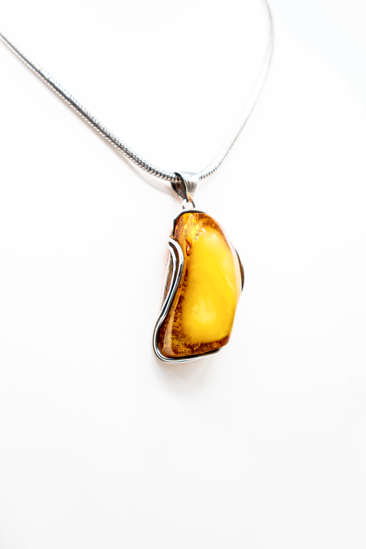 Amber artwork – elegant silver pendant for women