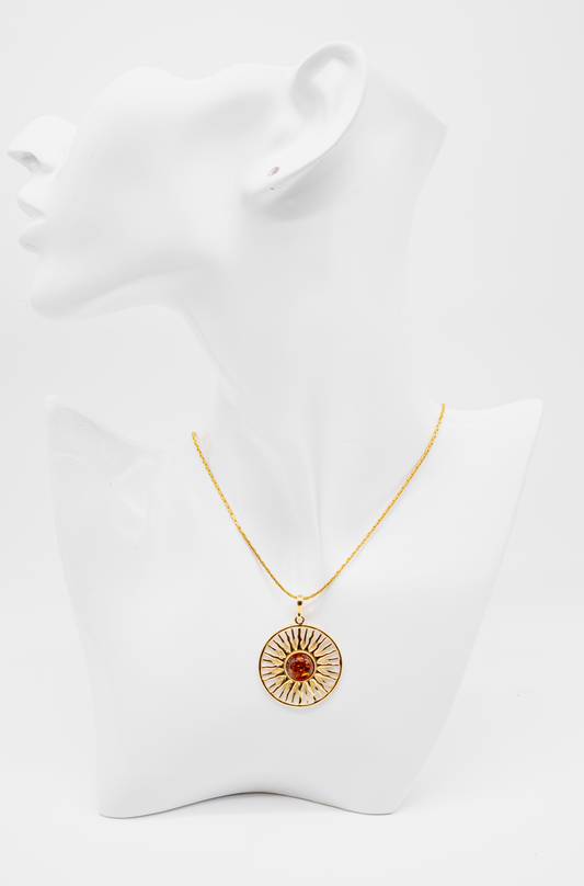 Anhänger "Sonne" aus Bernstein: 24 Karat vergoldet