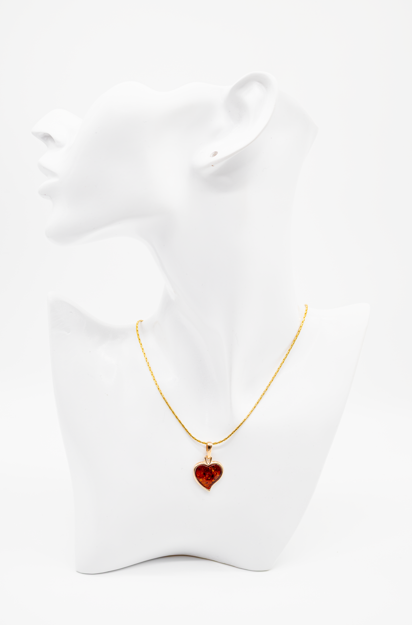 Herzförmiger Bernstein Anhänger vergoldet