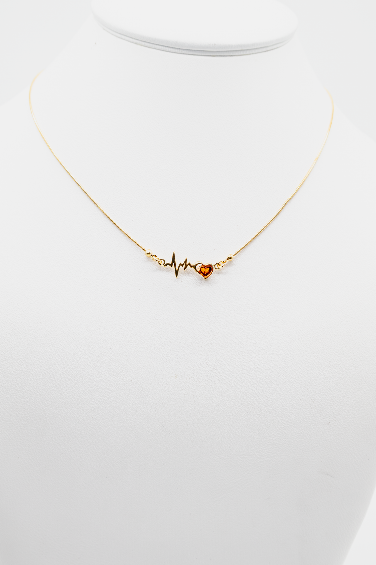 Romantisches Collier: EKG-Linie in Gold mit Bernstein