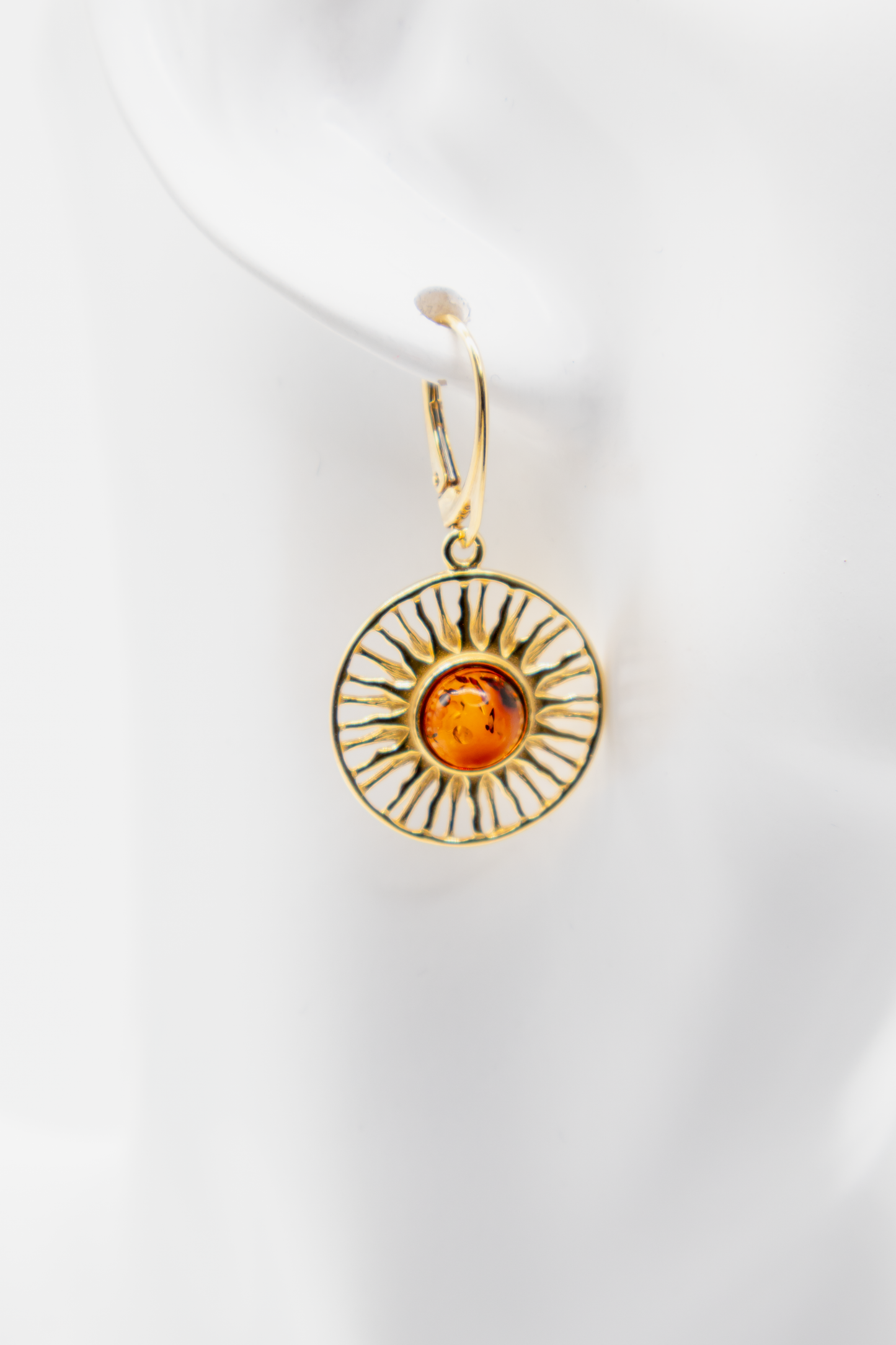 Damen Ohrschmuck: Strahlen-Design mit warmem Bernstein