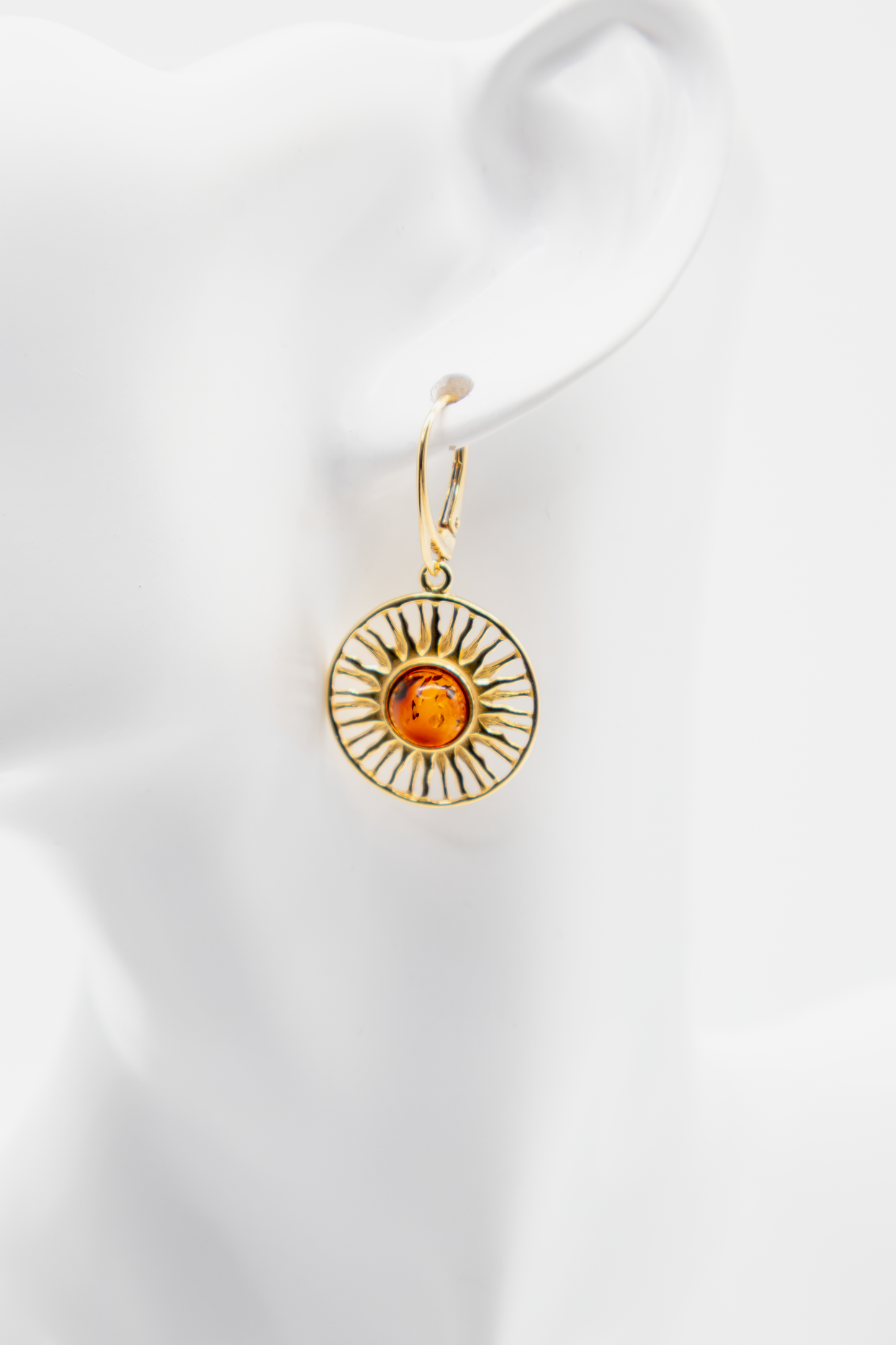 Damen Ohrschmuck: Strahlen-Design mit warmem Bernstein