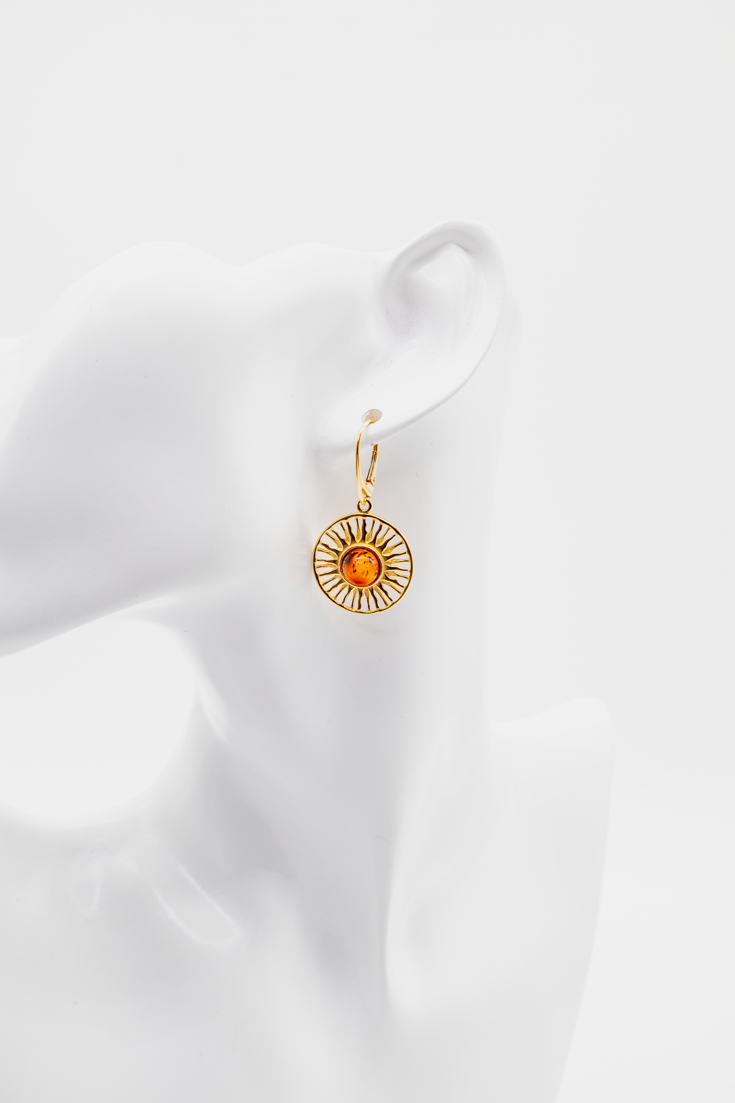 Damen Ohrschmuck: Strahlen-Design mit warmem Bernstein