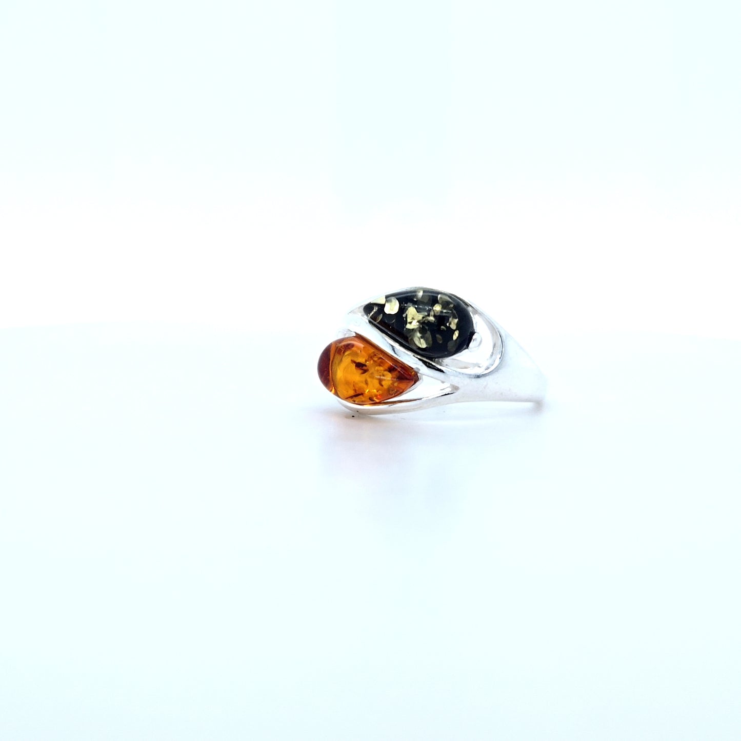 Elegant designer ring with yellow and red amber