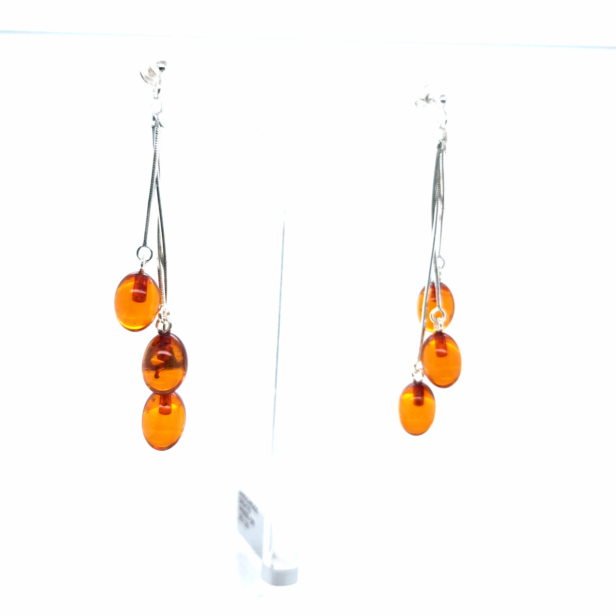 Stilvolle Hänge-Ohrstecker mit echtem Bernstein – Zarter, glänzender Ohrschmuck in leuchtenden Orangetönen