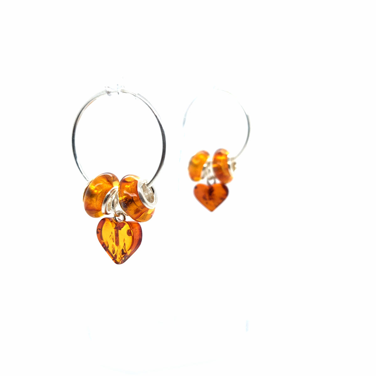 Silber-Creolen mit mehreren Bernstein-Herzen – Handgearbeiteter Ohrschmuck