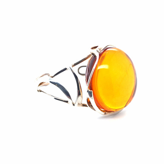 Handgearbeiteter Silber-Armreif Unikat – Luxuriöse Armspange mit großem orangen Ostsee-Bernstein