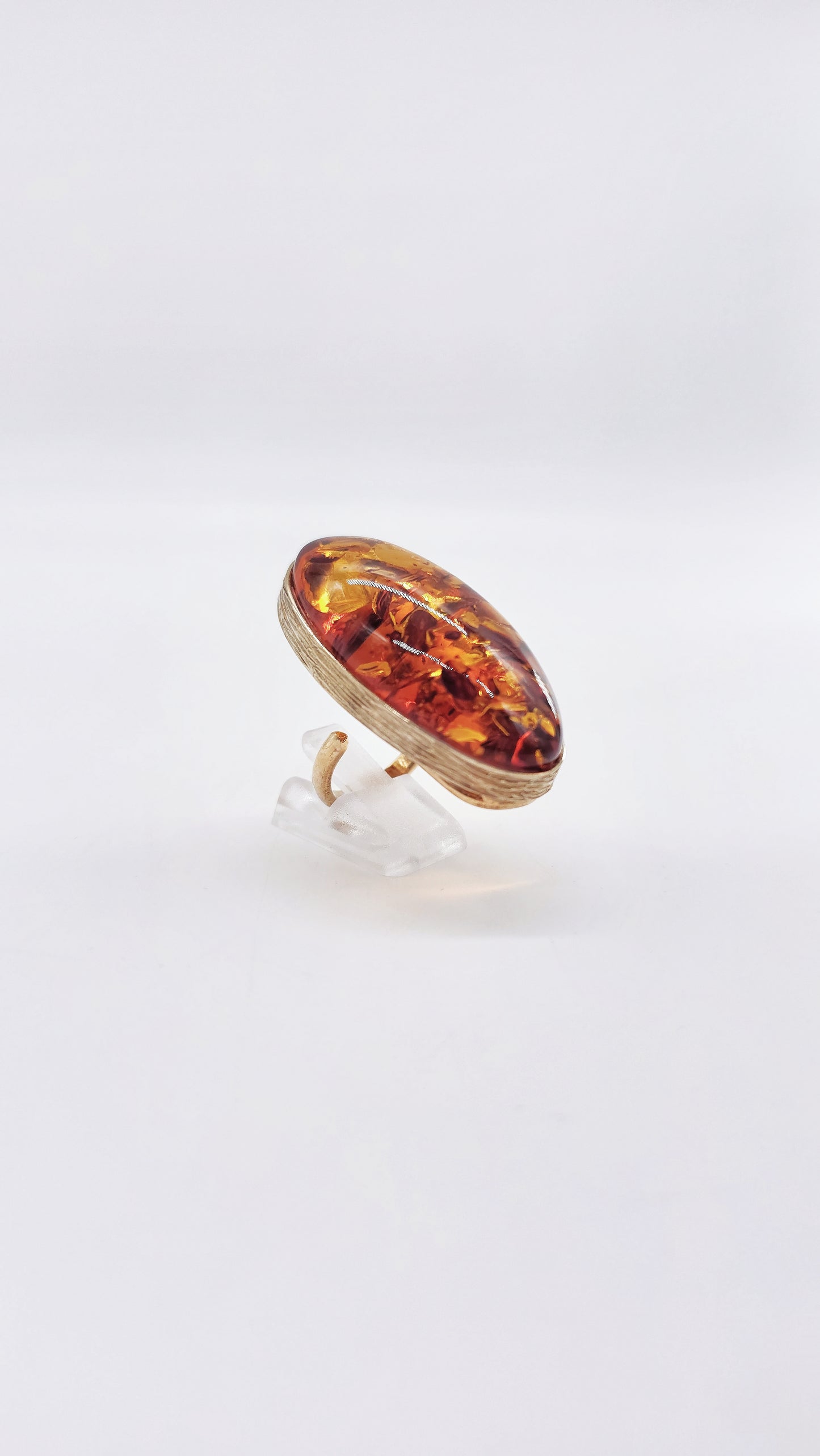 Unique ring: gold-plated silver with bright amber