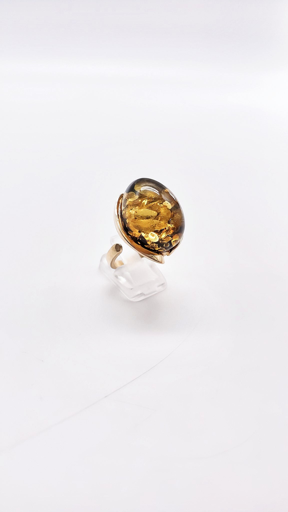 Elegant style: amber in gold setting