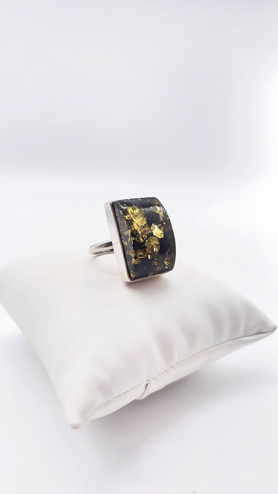 Adjustable silver ring with green amber – Handmade design