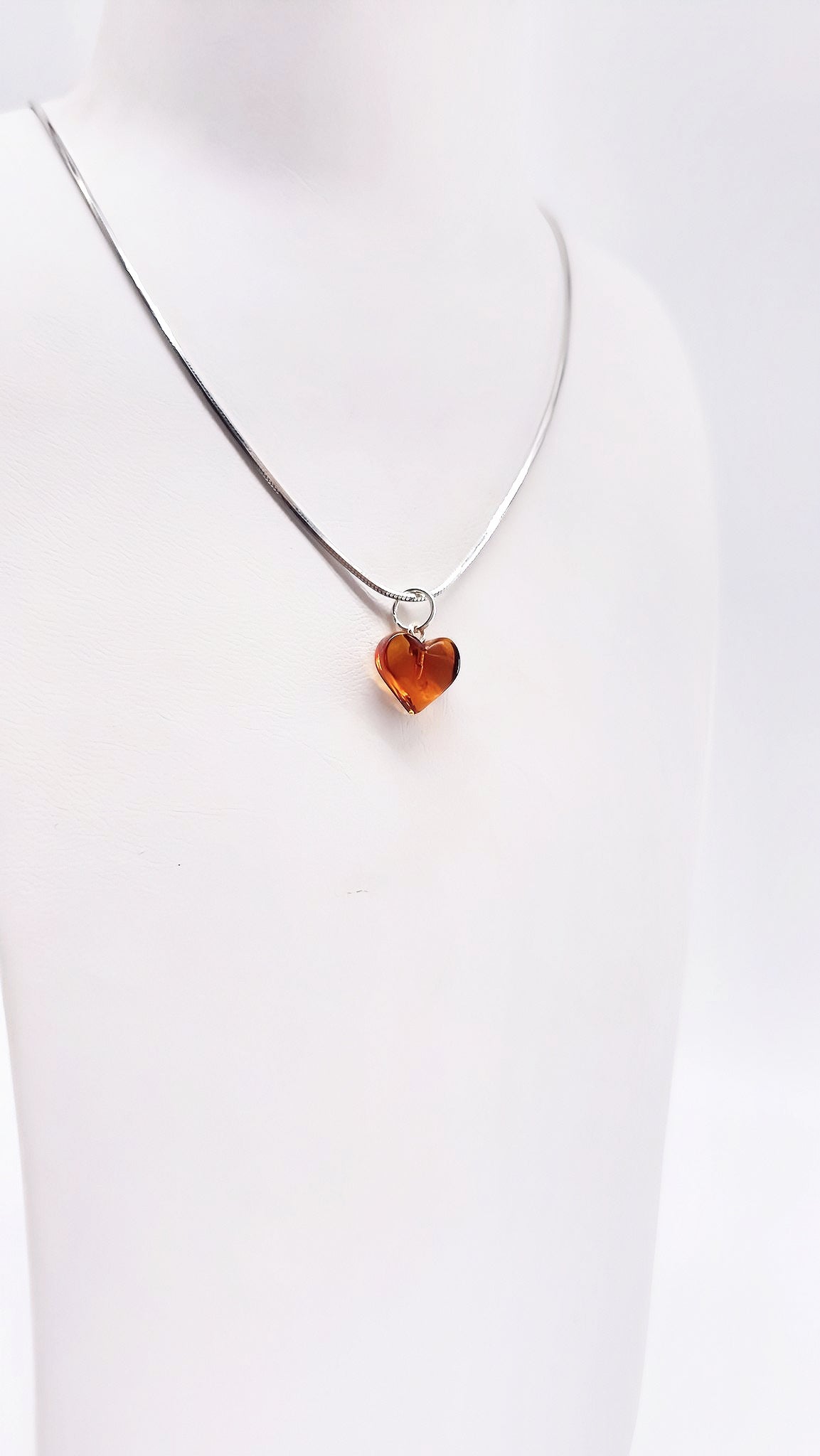 Romantic jewelry set amber hearts in silver setting