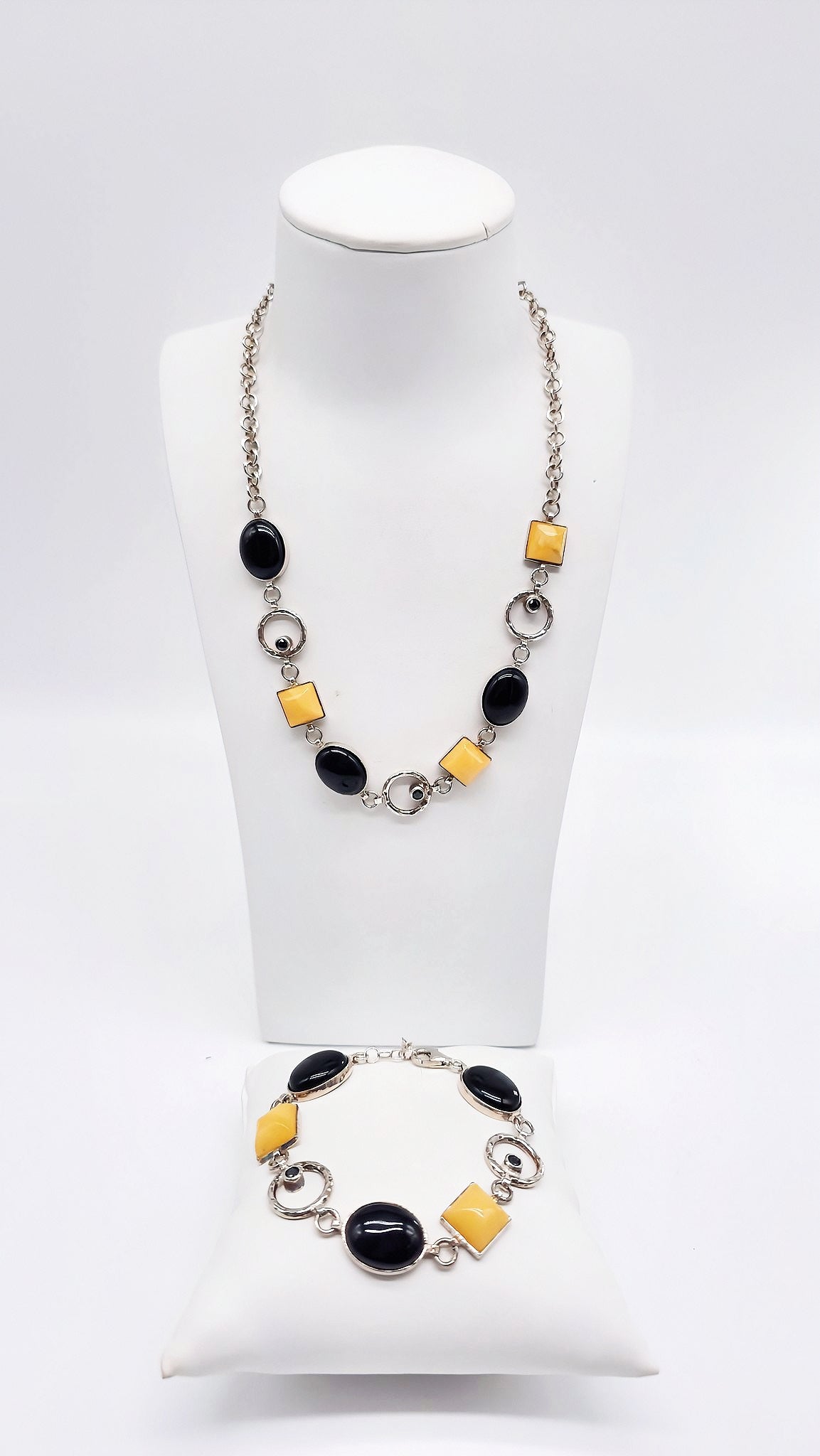 Barnsteen-onyx collier met zilveren karabijnsluiting