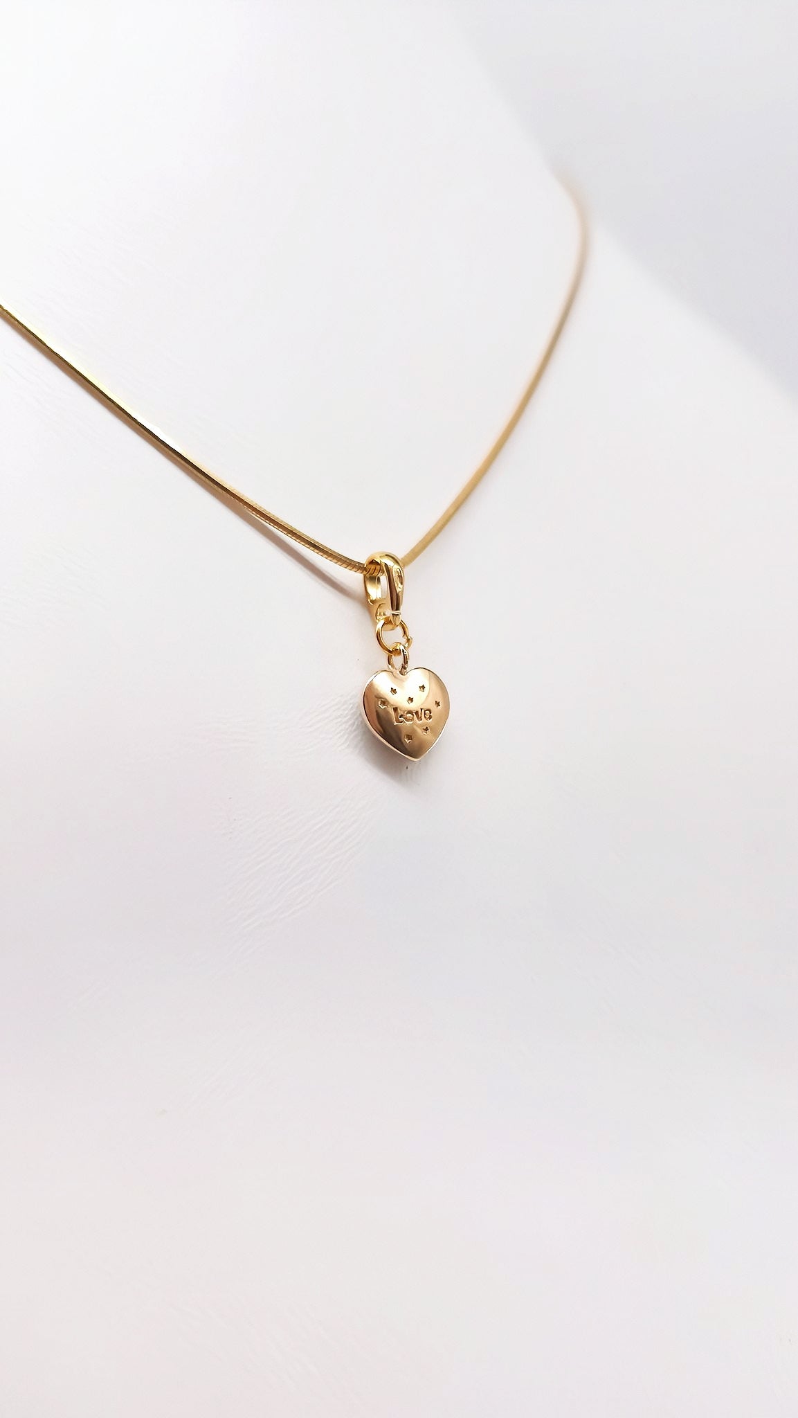 Jewelry with meaning: Heart pendant with genuine amber