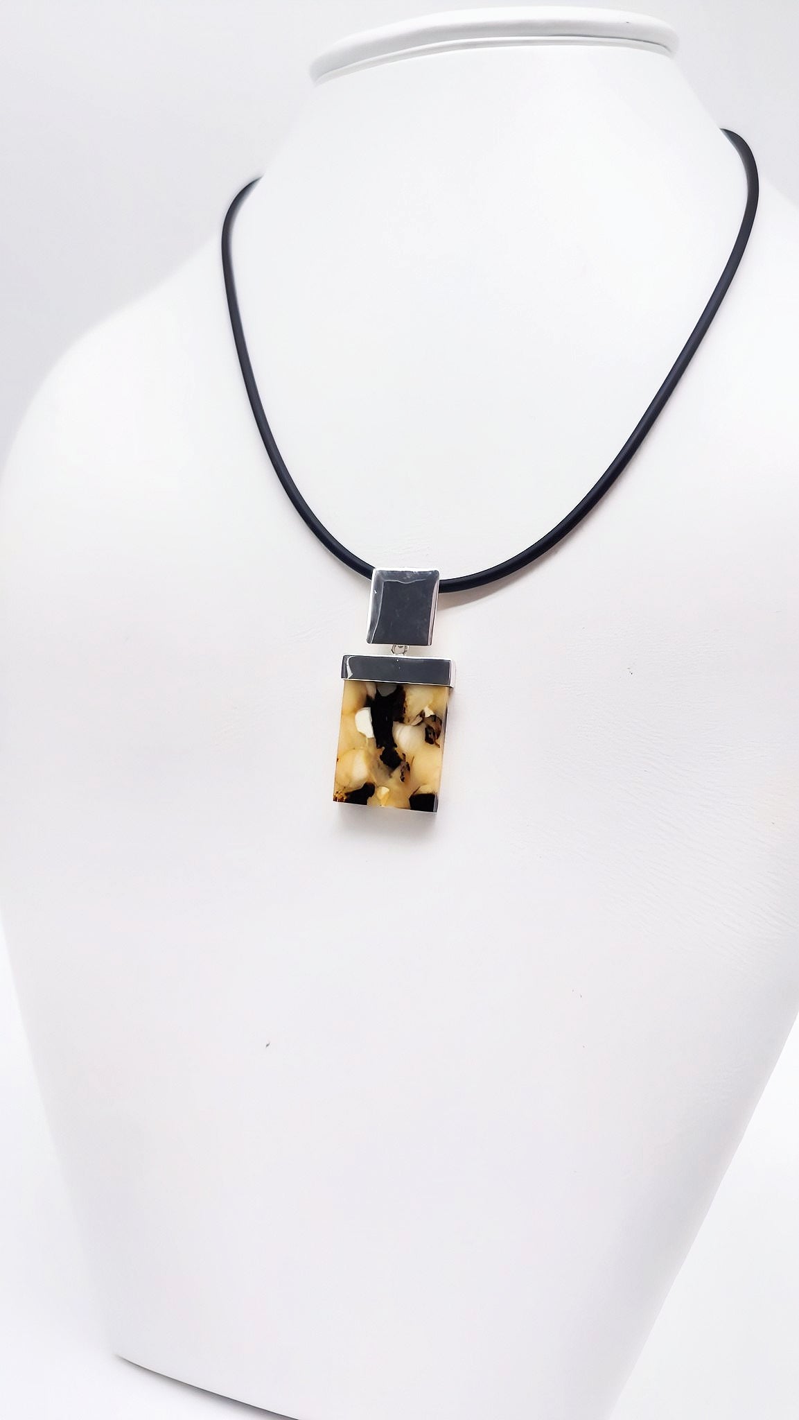 Striking amber pendant for men – handmade