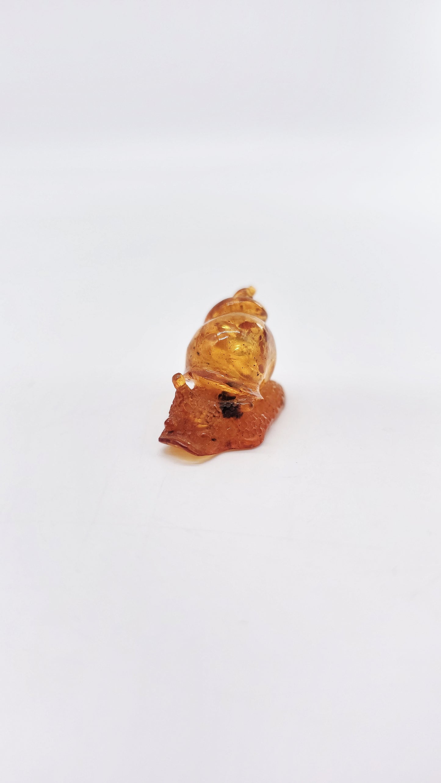 Snail made of natural amber – talisman for gentle progress