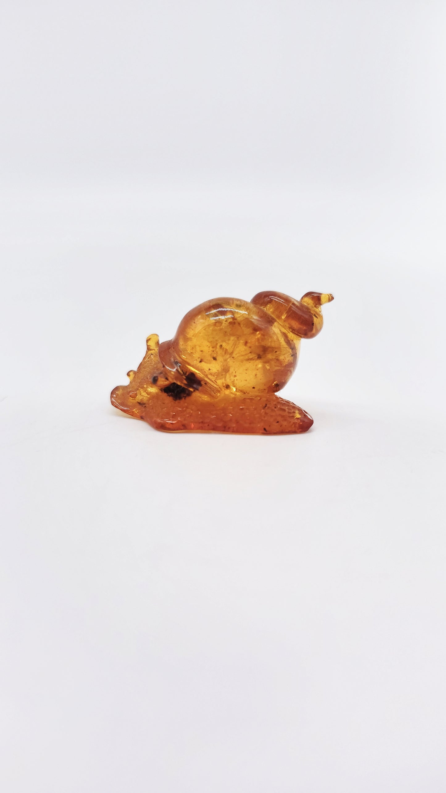 Snail made of natural amber – talisman for gentle progress