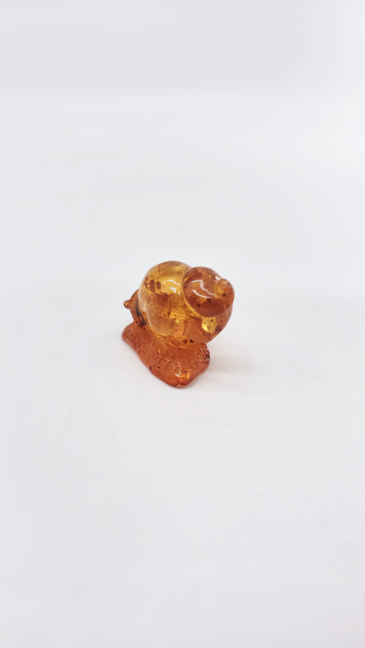 Snail made of natural amber – talisman for gentle progress