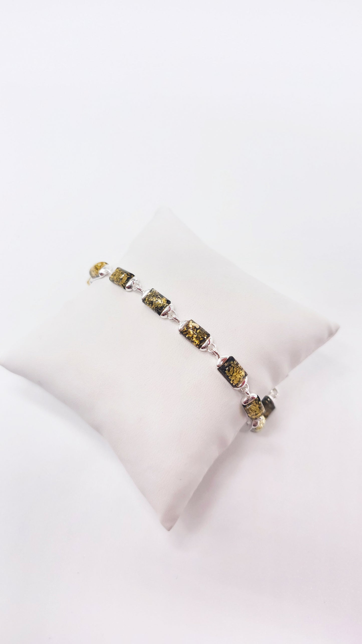 Classic bracelet with green amber for women