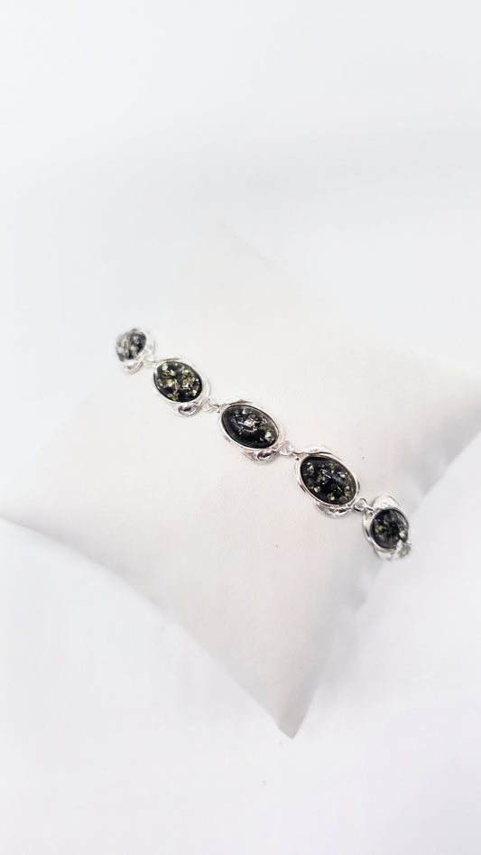 Silver bracelet with cognac-colored amber