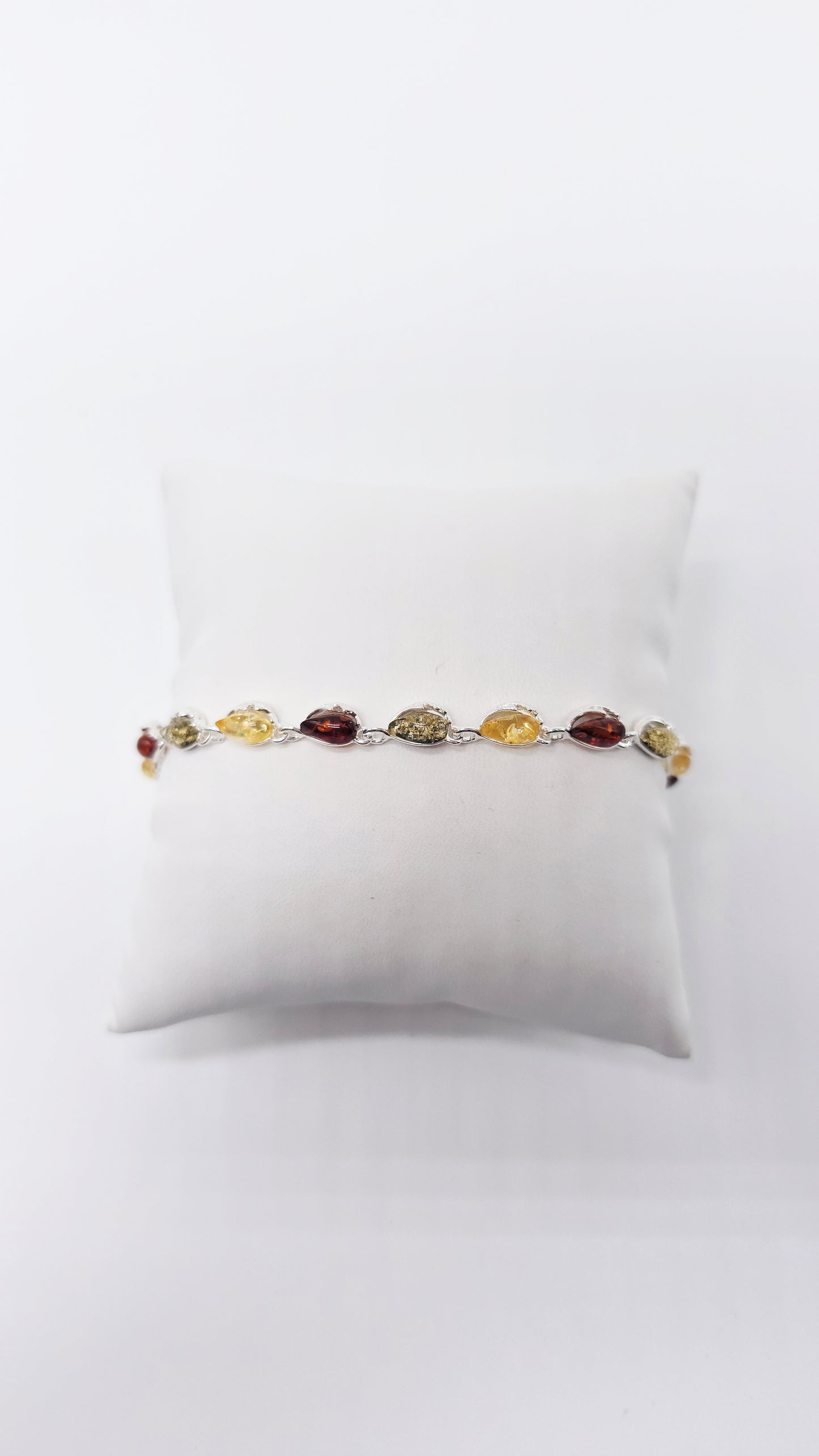 Silver drop bracelet with multicolor amber