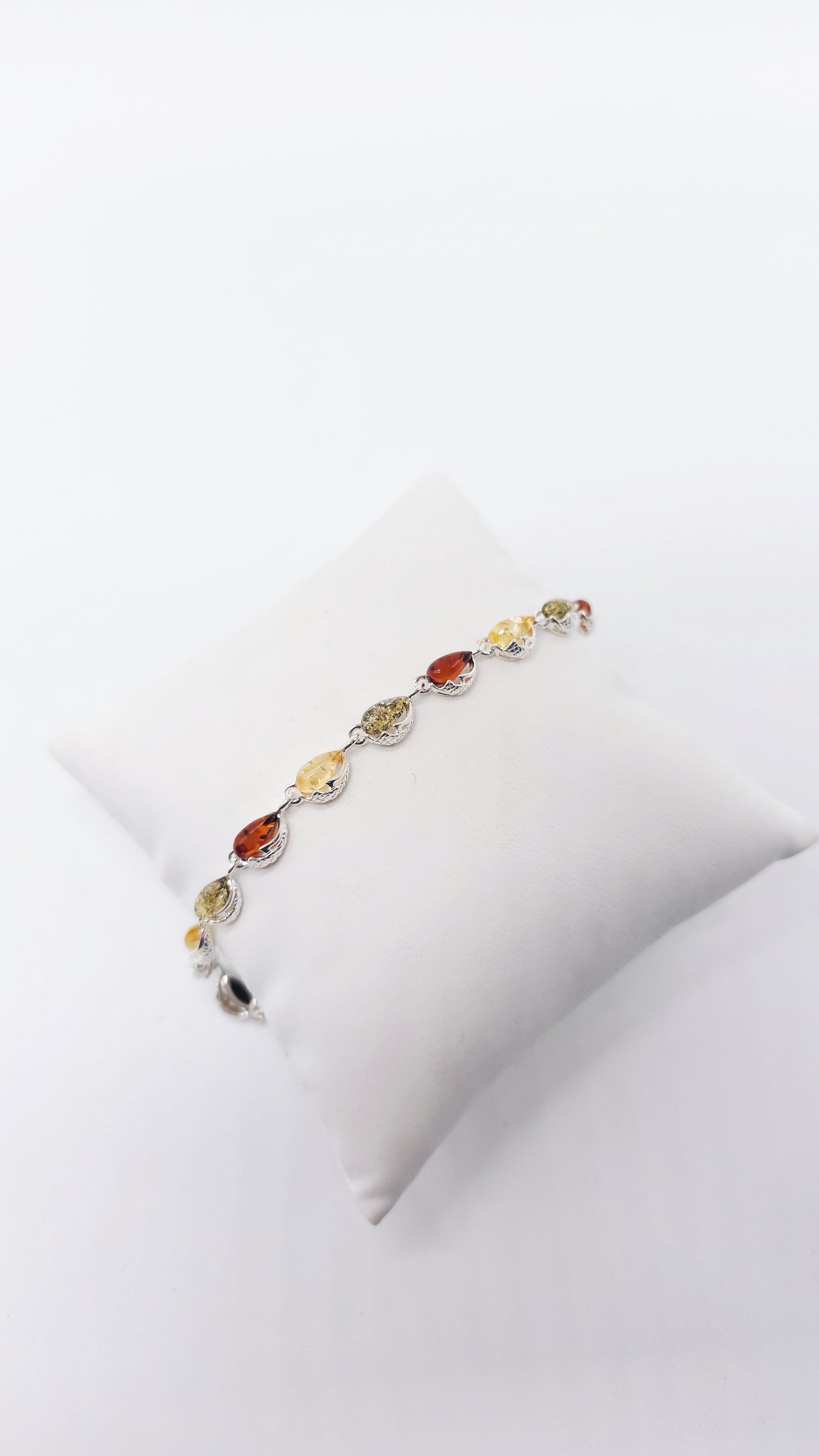 Silver drop bracelet with multicolor amber