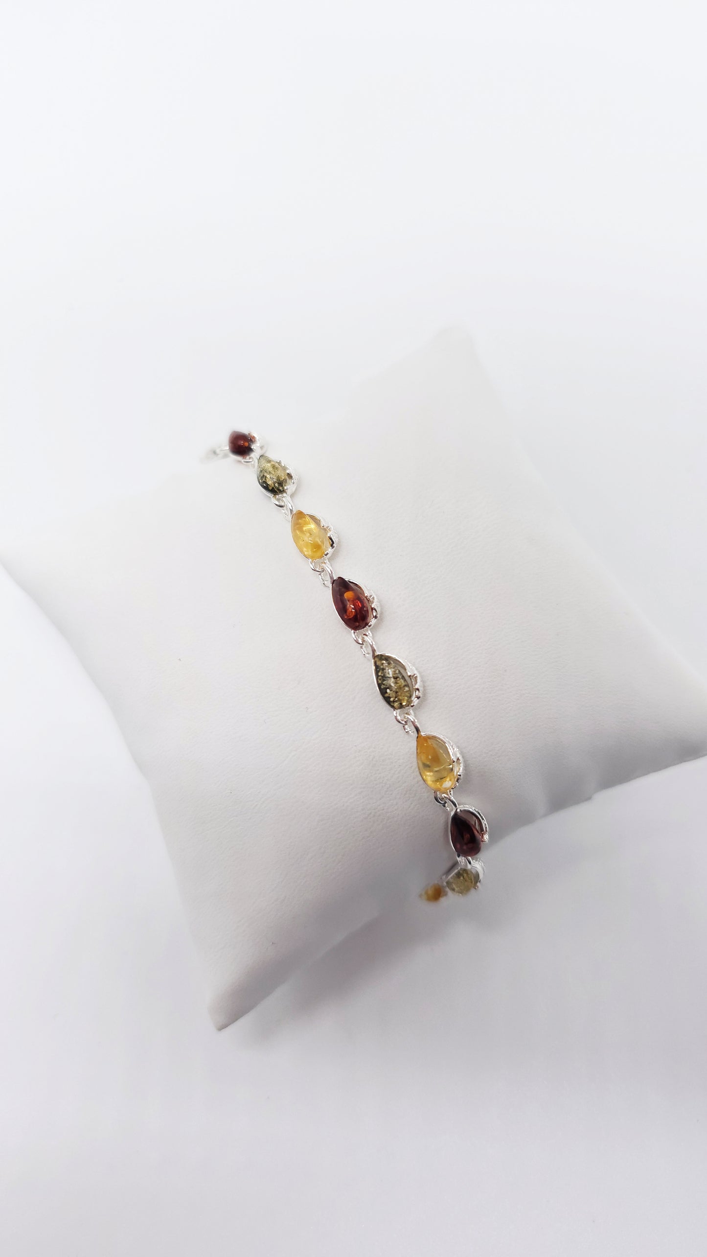 Silver drop bracelet with multicolor amber