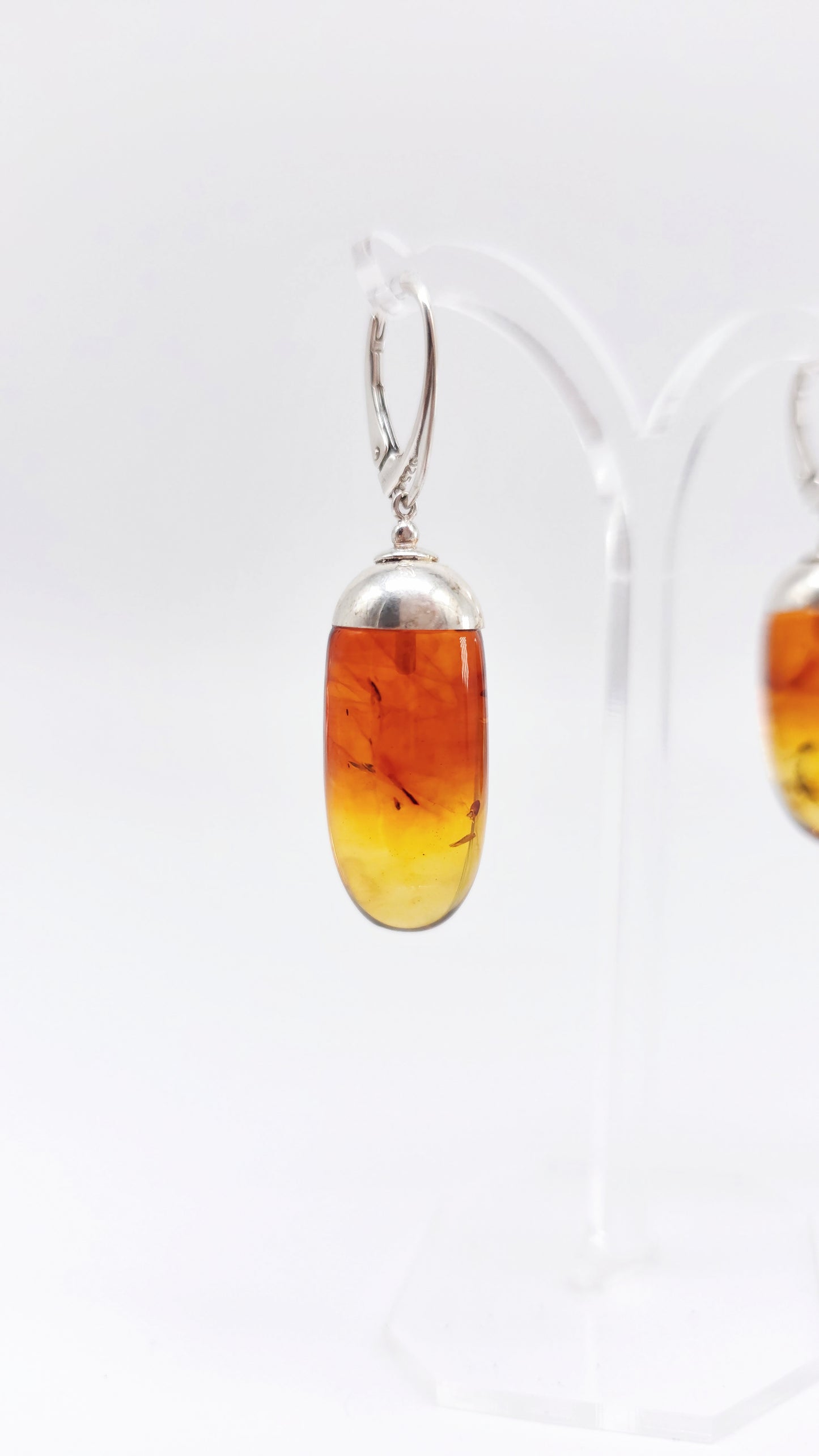 Earrings with real unique amber