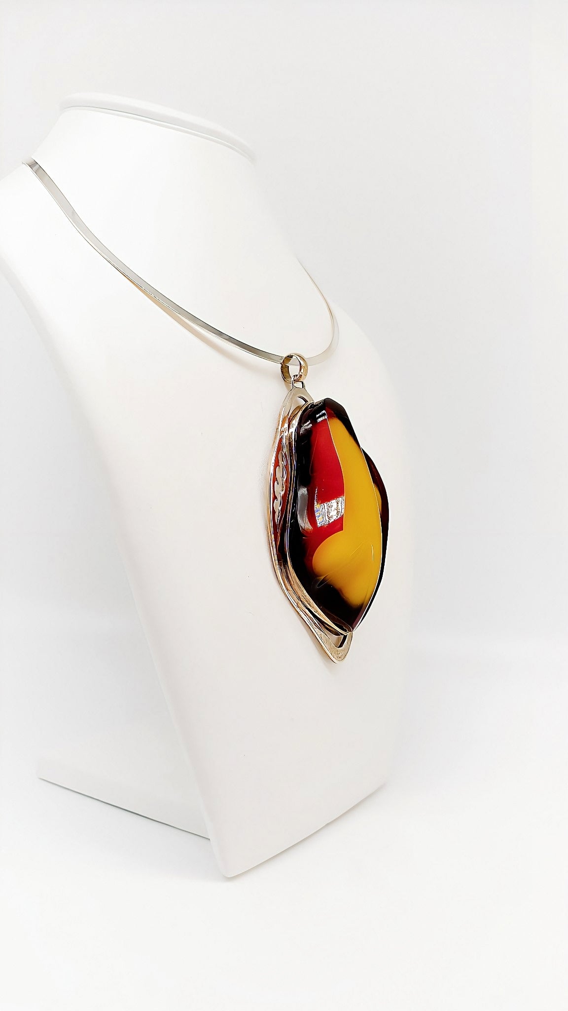 Mystical elegance: unique piece made of amber and silver