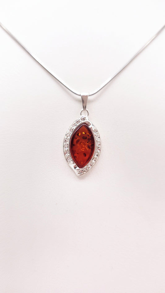 Schicker Bernstein Unikatschmuck mit Zirkonia in Silber