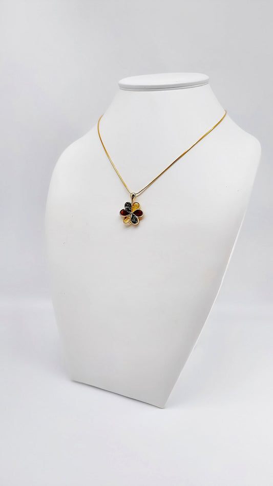 Eleganz in Blüte: Vergoldeter Bernstein-Schmuck