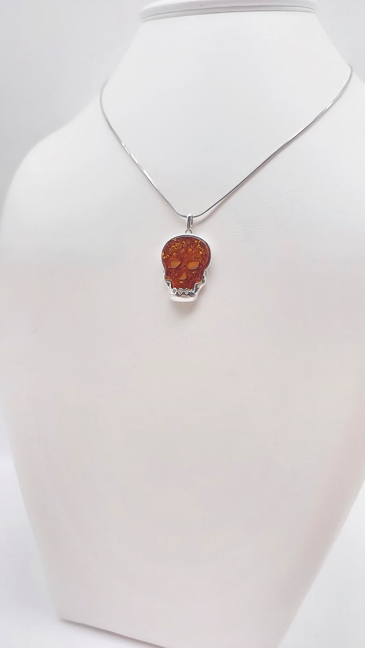 Sterling silver skull with amber
