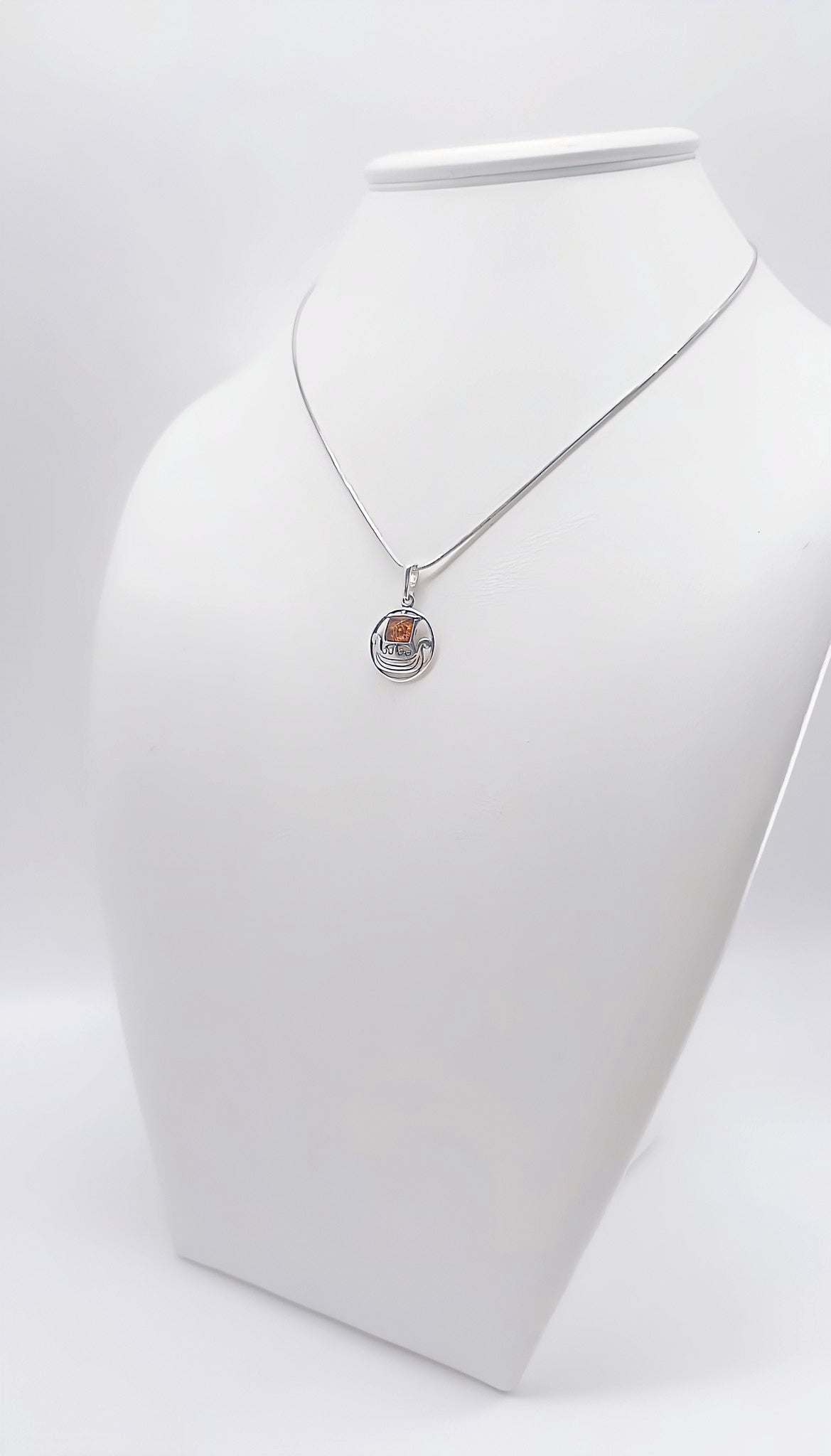Amber ship: maritime design in silver