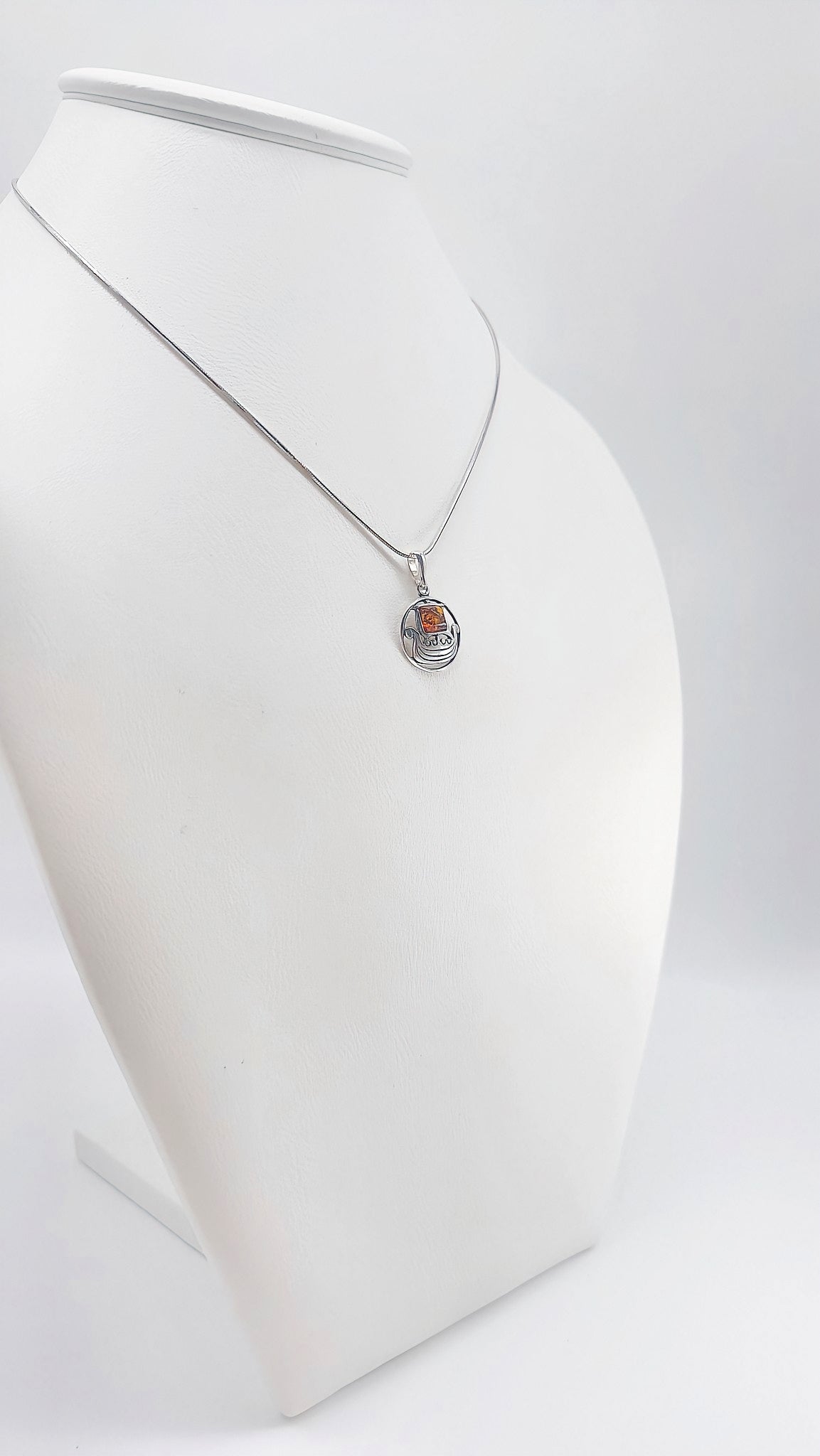 Amber ship: maritime design in silver