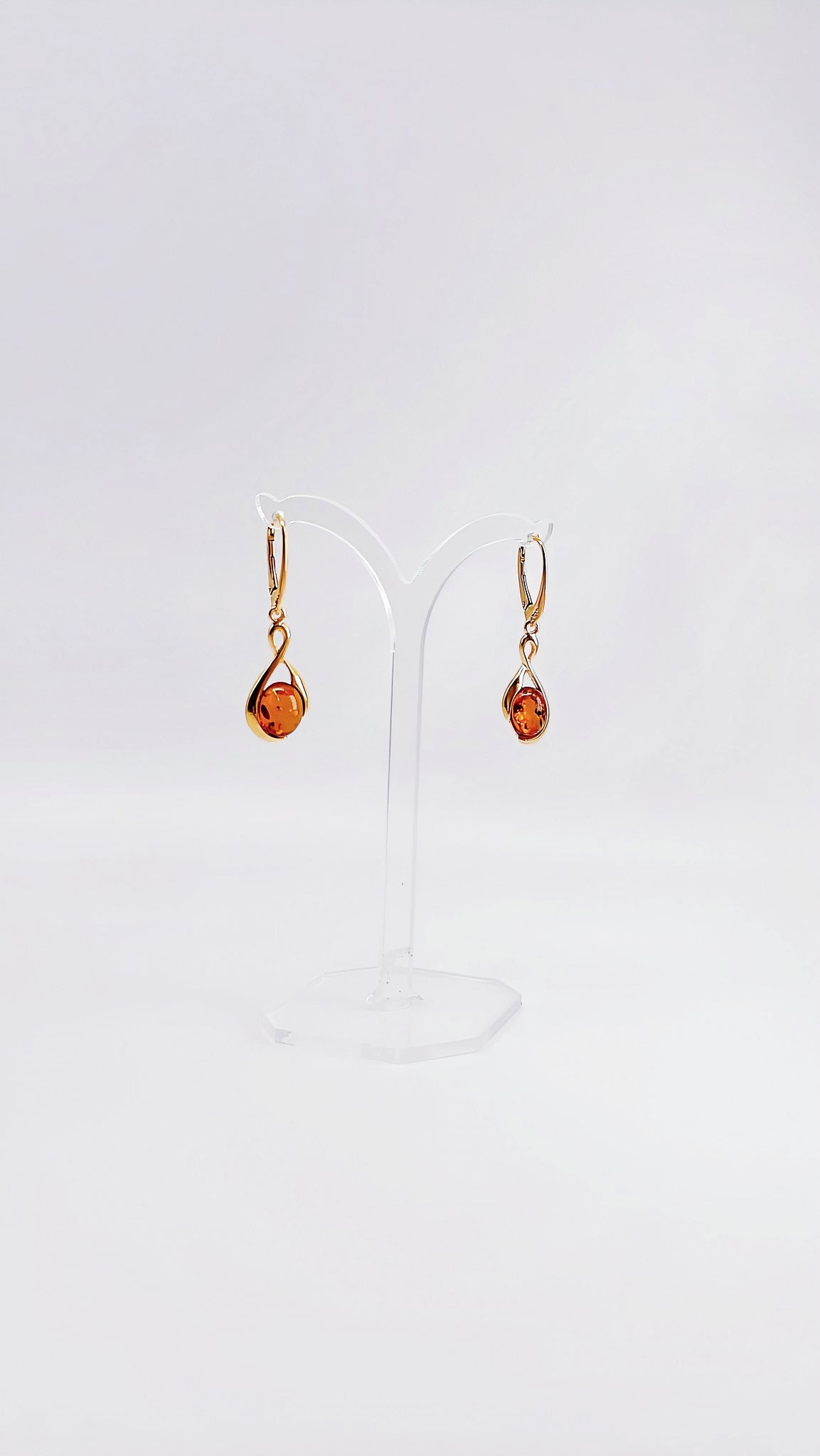 Gold-plated amber earrings with yellow stone