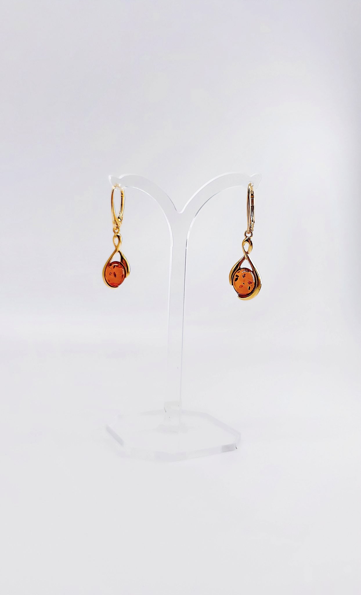 Gold-plated amber earrings with yellow stone